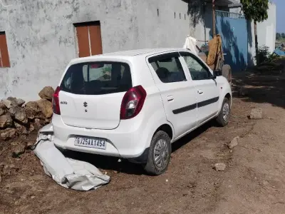 White Maruti Suzuki Alto Family Car White Maruti Suzuki Alto Family Car