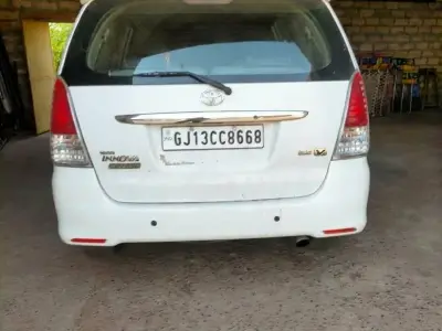 White Toyota Innova MPV with Spoiler White Toyota Innova MPV with Spoiler
