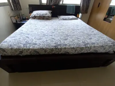Double bed with storage mattress and side table Double bed with storage mattress and side table