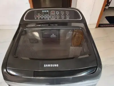 Samsung 8 kg top load whosing machine Good ranig condisan