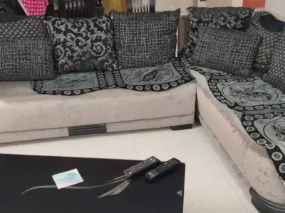 L shap sofa set with pillows