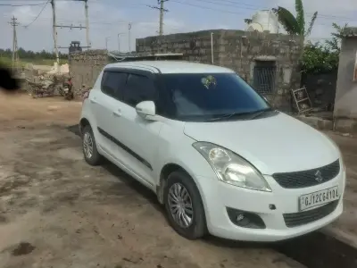 Maruti Suzuki Swift 2014 White Car Maruti Suzuki Swift 2014 White Car