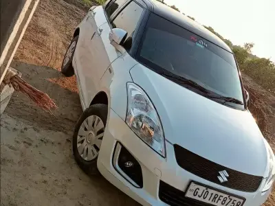 White Maruti Suzuki Swift DZire, Owner 2 White Maruti Suzuki Swift DZire, Owner 2