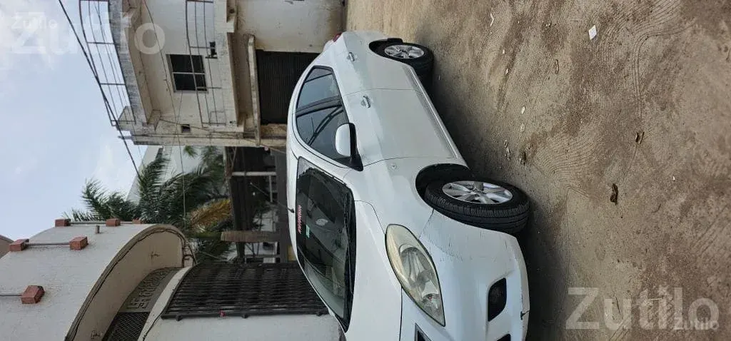 2012 Nissan Sunny Diesel with AC and New Tyres - Cars - Dhokadva - Image 2