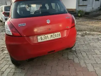 Red Maruti Swift VDI Diesel Hatchback Red Maruti Swift VDI Diesel Hatchback