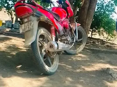 Red Motorcycle in Running Condition Red Motorcycle in Running Condition
