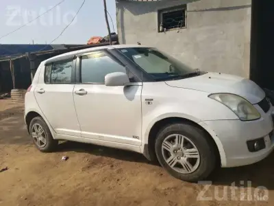 2010 Maruti Suzuki Swift White Hatchback 2010 Maruti Suzuki Swift White Hatchback