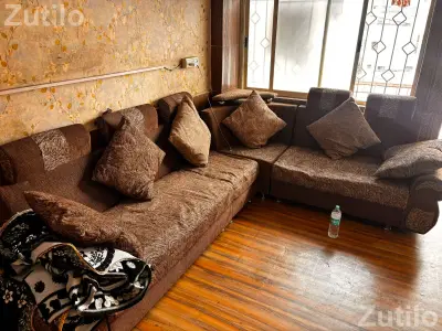 L shaped Sofa with pillows, Brown L shaped Sofa with pillows, Brown
