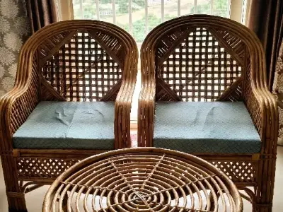 Cane chairs and tea table Cane chairs and tea table