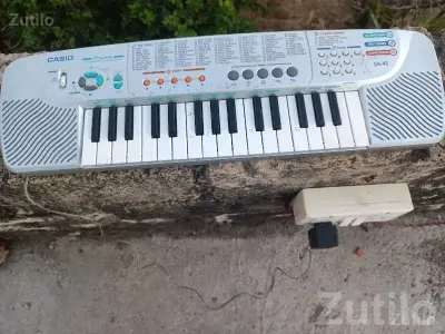 Casio SA-45 Mini Keyboard with Adapter