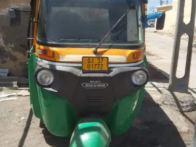 Bajaj Maxima Green Yellow Auto Rickshaw