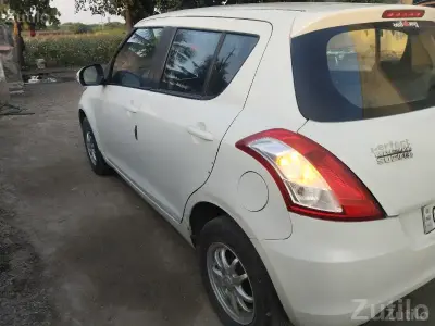 White Maruti Suzuki Swift Hatchback White Maruti Suzuki Swift Hatchback