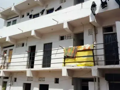 Colony Building with House and Shop for Sale Colony Building with House and Shop for Sale