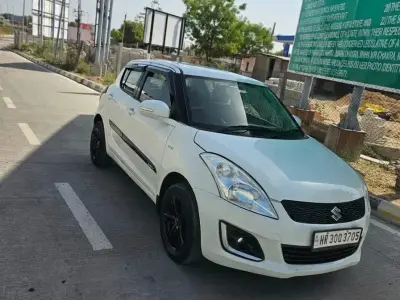 Maruti Swift VDI Diesel – White Hatchback Maruti Swift VDI Diesel – White Hatchback