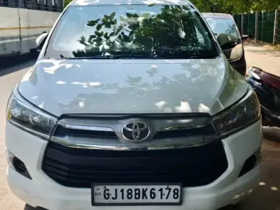 White Toyota Innova Crysta MPV